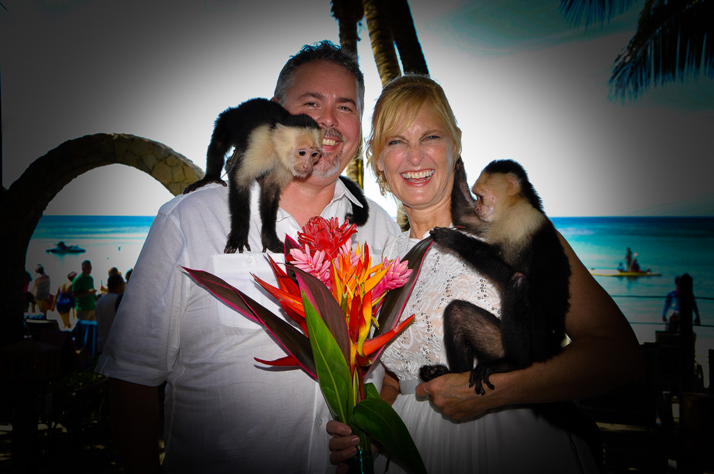 Happy Couple tying the knot with these adorable Roatan monkeys.<br>Wedding planner <a href="http://www.westbaylodge.com/" title="West Bay Lodge, Roatan">West Bay Lodge</a>.